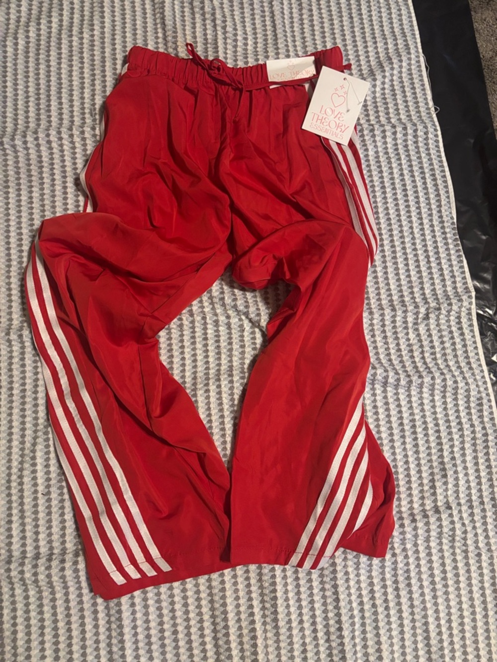Red Track Pants with White Side Stripes